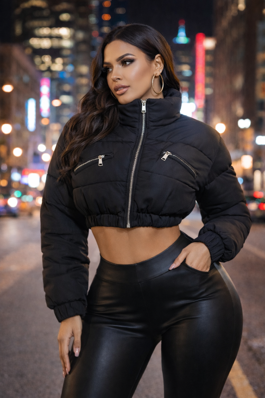 Stay bold and compact with this cropped puffer jacket that commands attention. Engineered with