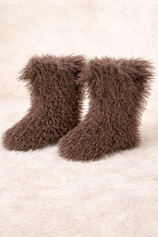 Step into bold sophistication with these Luxe Shag Fur Boots. Crafted with sumptuous shag fur 