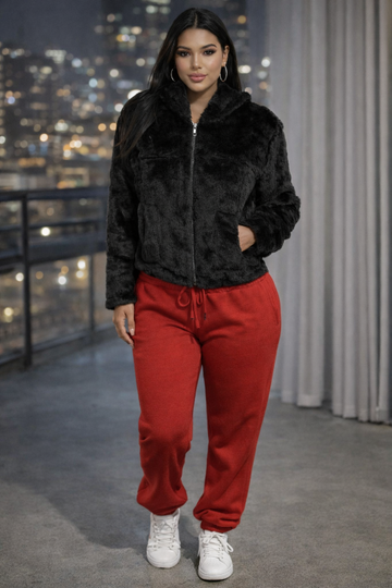 Unleash your boldest self in this statement-making zip-up fur jacket. 