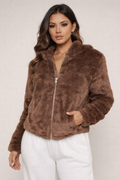 Unleash your boldest self in this statement-making zip-up fur jacket. 